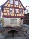 Bei Aufgrabungen wurde 2006 das Gewölbe unter dem Haus freigelegt. Foto: Albrecht Bedal (StadtA Schwäb. Hall DIG 11578)