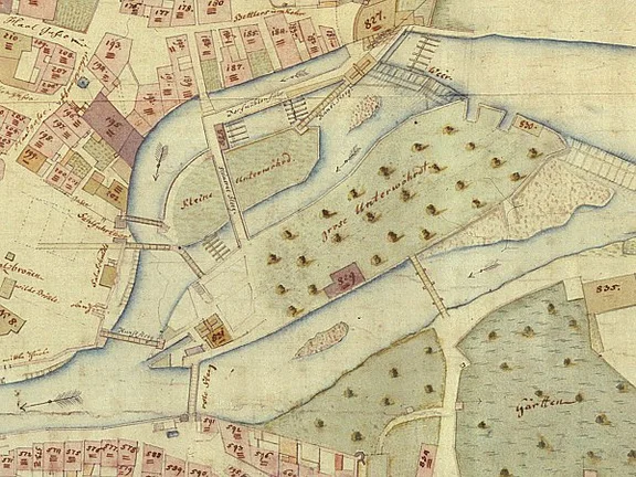 Ausschnitt aus dem Stadtplan von 1816. Vom Stollen sind nur der Einlauf am Südostende und der Auslauf am Nordwestende dargestellt. Das Mühlrad scheint frei über dem Triebwasserstollen zu stehen (StadtA Schwäb. Hall 16/69)