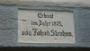 Bauinschrift über dem Eingang von 1875, August 2007. Foto: Dietmar Hencke (StadtA Schwäb. Hall DIG 02863)