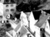 In einem Ausschnitt eines undatierten Fotos der Neustetterstraße von der Comburg aus ist die Synagogenruine mit teilweise eingestürzem Giebel nach dem Pogrom vom 9./10. November 1938 erkennbar. Foto: Friedrich Gschwindt (StadtA Schwäb. Hall FS 40054)