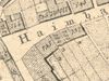 Ausschnitt aus dem Primärkataster  von 1827. Das Anwesen hat die Nummer 733 (untere Zeile, 2. v. r.) (StadtA SHA S13/0583)