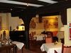 Restaurant des „Adelshofs“ im Erdgeschoss, ehem. „Ratskeller“ mit Wandmalereien um 1940, Mai 2009. Foto: Daniel Stihler (StadtA Schwäb. Hall DIG 01441)
