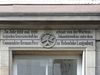 Inschrift über dem Portal mit Johanniterkreuz, Januar 2008. Foto: Dietmar Hencke (StadtA SHA Server Häuserlexikon)